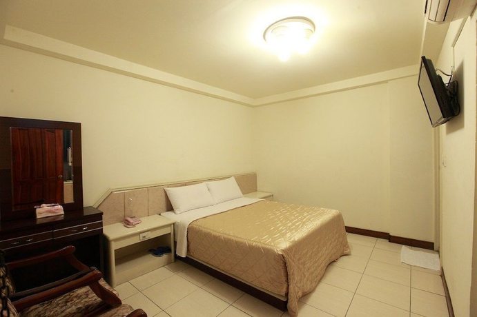 Imagen de la habitación del Hotel Yong Qi. Foto 2
