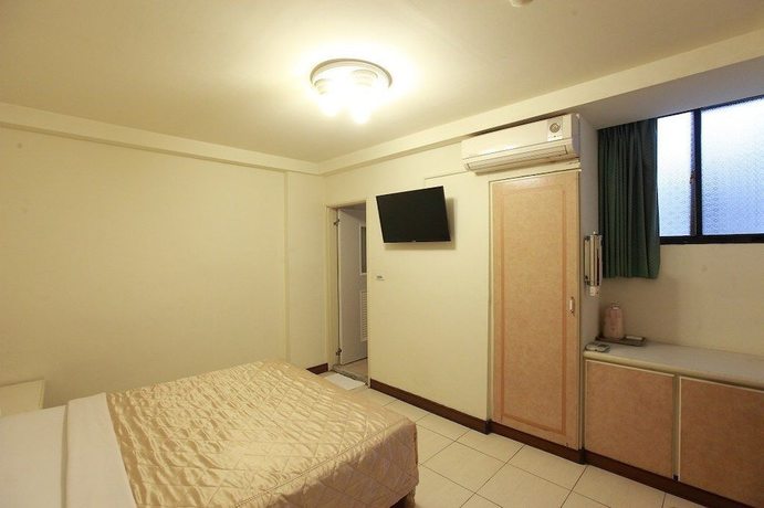 Imagen de la habitación del Hotel Yong Qi. Foto 4