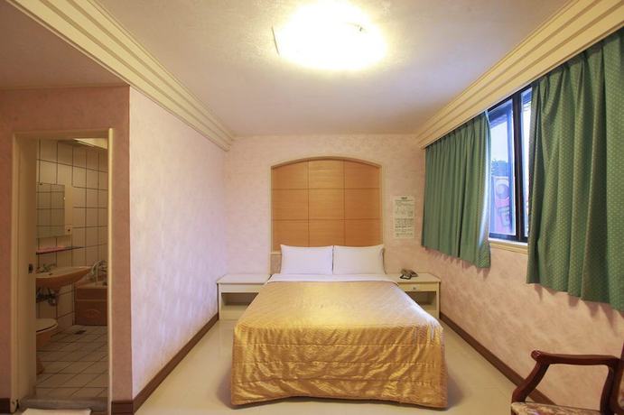 Imagen de la habitación del Hotel Yong Qi. Foto 6