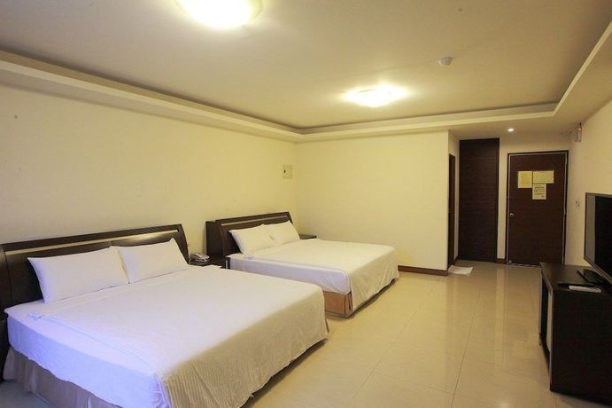 Imagen de la habitación del Hotel Yong Qi. Foto 7