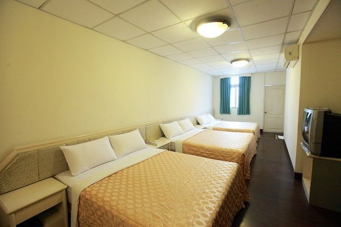 Imagen de la habitación del Hotel Yong Qi. Foto 8