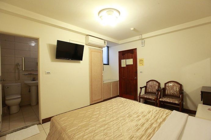 Imagen de la habitación del Hotel Yong Qi. Foto 9