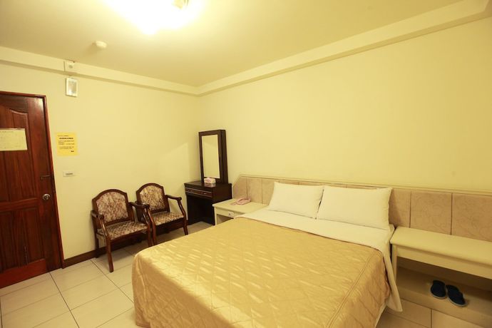 Imagen de la habitación del Hotel Yong Qi. Foto 11