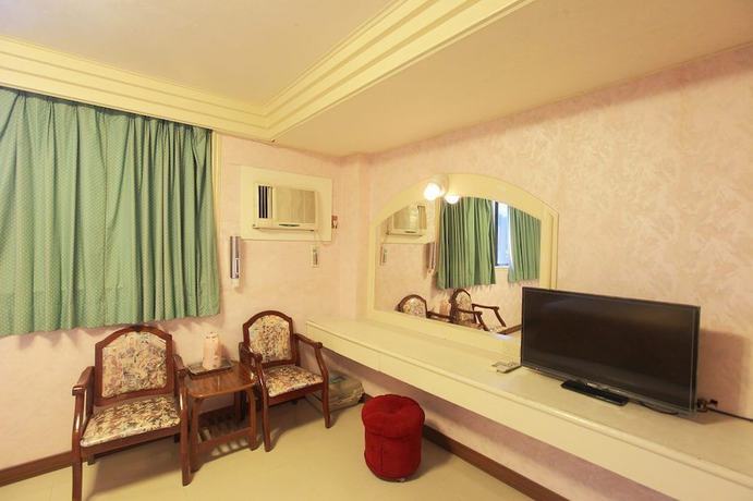 Imagen de la habitación del Hotel Yong Qi. Foto 13