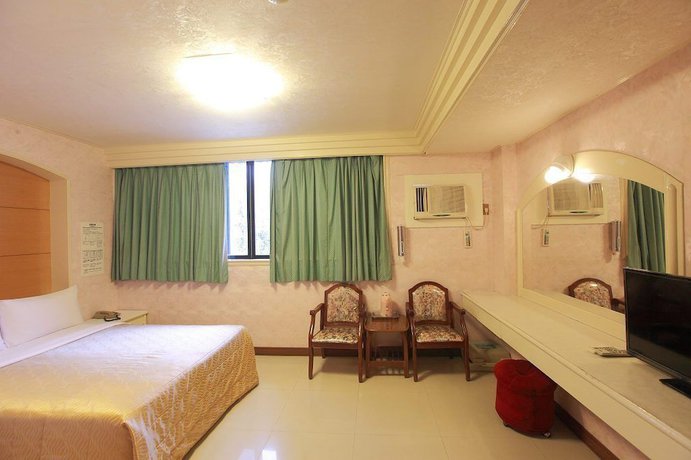 Imagen de la habitación del Hotel Yong Qi. Foto 16