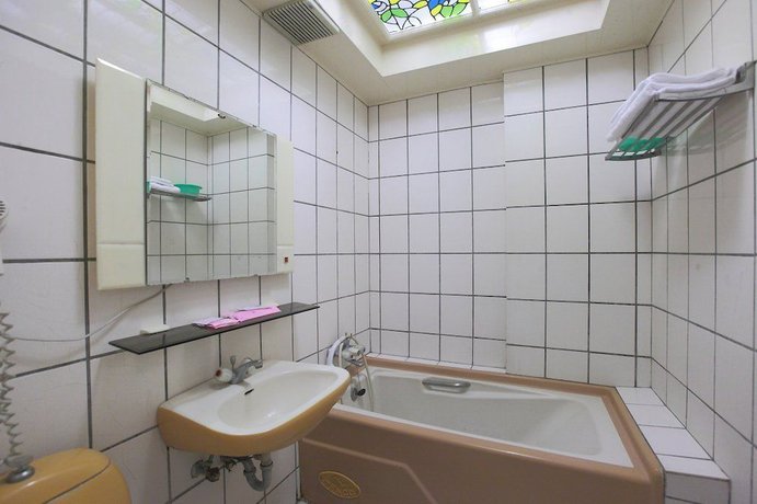 Imagen de la habitación del Hotel Yong Qi. Foto 17