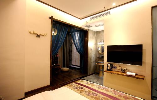 Imagen de la habitación del Hotel Yongfurong Jingxinju Guest House. Foto 7