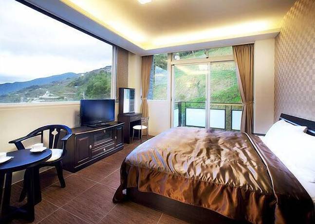 Imagen de la habitación del Hotel Yonghe Resort. Foto 11