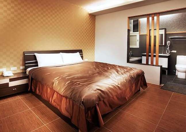 Imagen de la habitación del Hotel Yonghe Resort. Foto 14