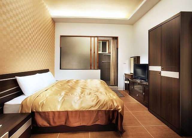 Imagen de la habitación del Hotel Yonghe Resort. Foto 15