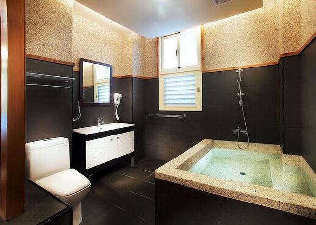 Imagen de la habitación del Hotel Yonghe Resort. Foto 16