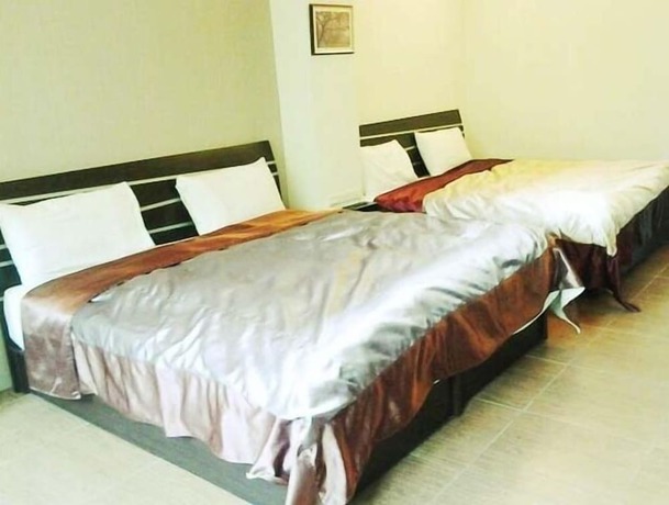 Imagen de la habitación del Hotel Yonghe Resort. Foto 18