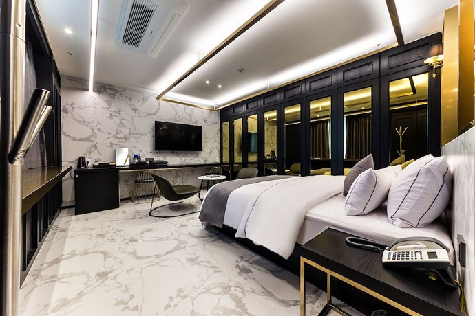 Imagen de la habitación del Hotel Yongin Astro. Foto 2