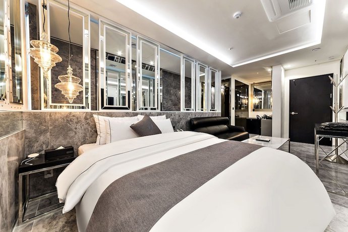 Imagen de la habitación del Hotel Yongin Astro. Foto 16