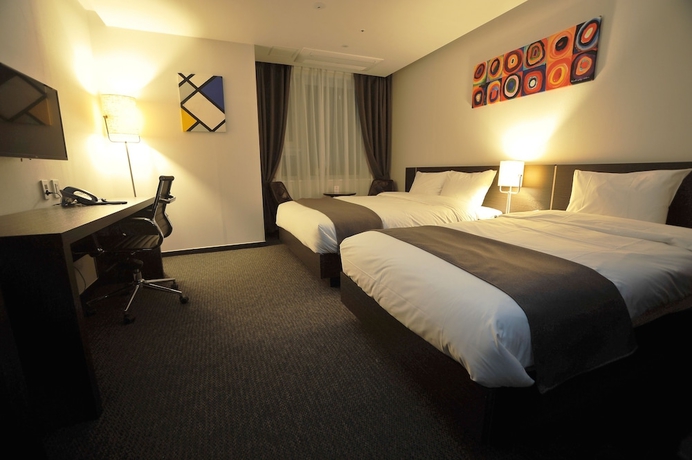 Imagen de la habitación del Hotel Yongin Central Co'op. Foto 8