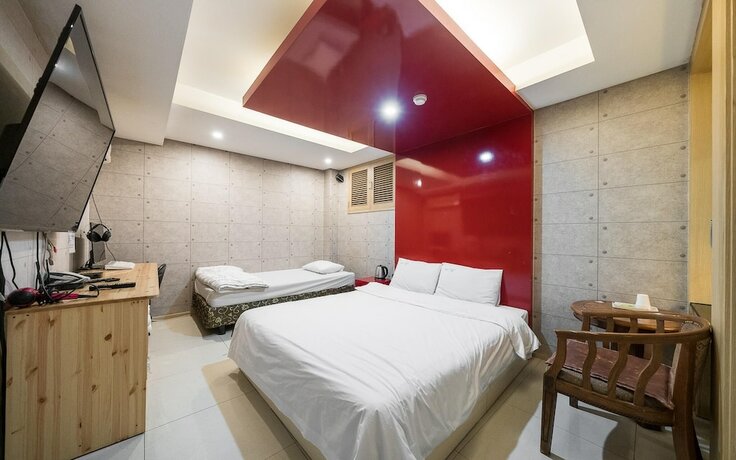 Imagen de la habitación del Hotel Yongin Chameleon. Foto 11