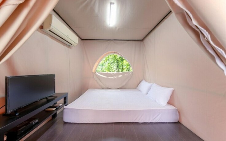 Imagen general del Hotel Yongin Cheoline Camping Land. Foto 18