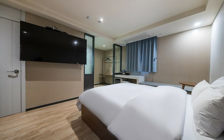 Imagen de la habitación del Hotel Yongin Oscar. Foto 12