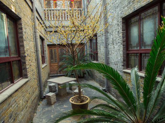 Imagen de los exteriores del Hotel Yongle Guqin Theme Inn. Foto 8