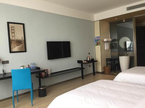 Imagen de la habitación del Hotel Yongrun Fengchao. Foto 5