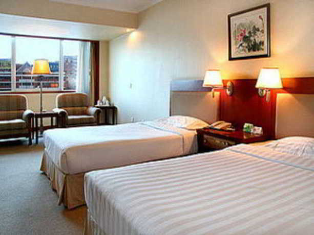 Imagen de la habitación del Hotel Yongxing Garden. Foto 1