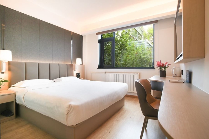 Imagen de la habitación del Hotel Yoo Beijing. Foto 2