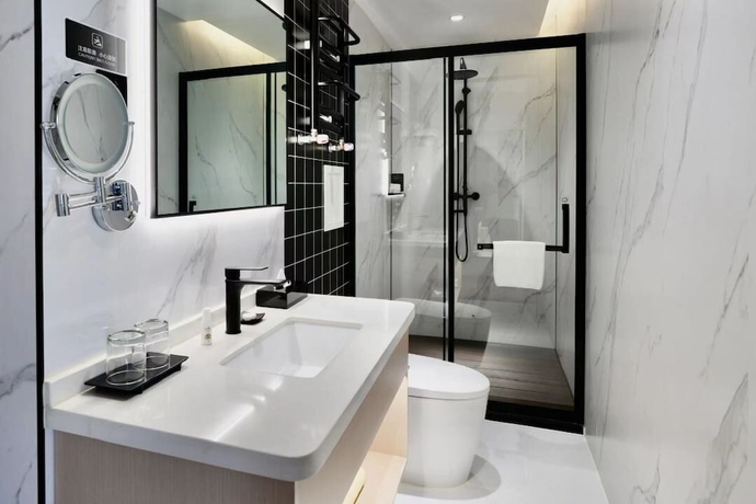 Imagen de la habitación del Hotel Yoo Beijing. Foto 12