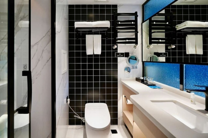 Imagen de la habitación del Hotel Yoo Beijing. Foto 14