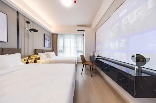 Imagen de la habitación del Hotel Yoomanjoo High City View - Shenzhenbei Railway Guanlan Avenue Xikeng. Foto 18