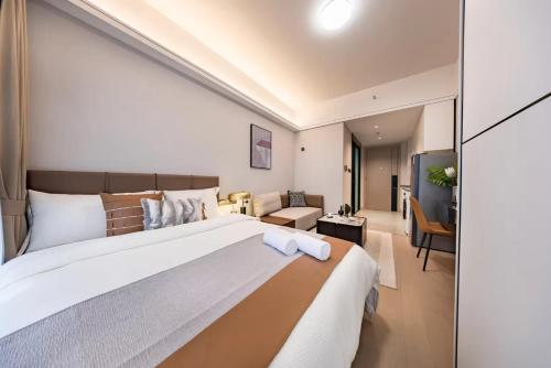 Imagen de la habitación del Hotel Yoomanjoo High City View - Shenzhenbei Railway Guanlan Avenue Xikeng. Foto 20