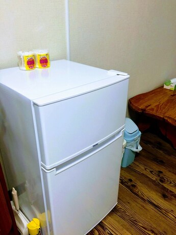 Imagen de la habitación del Hotel Yoron Tandy-house. Foto 23