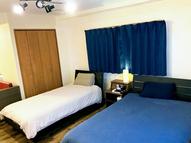 Imagen de la habitación del Hotel Yoron Tandy-house. Foto 24