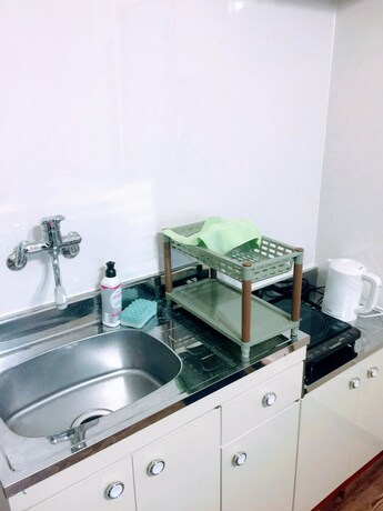 Imagen de la habitación del Hotel Yoron Tandy-house. Foto 27