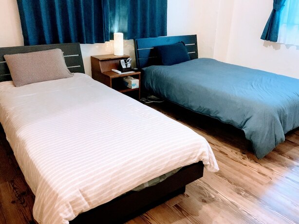 Imagen de la habitación del Hotel Yoron Tandy-house. Foto 29