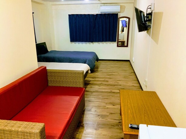 Imagen de la habitación del Hotel Yoron Tandy-house. Foto 31