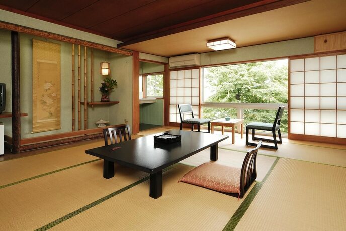 Imagen de la habitación del Hotel Yoshinoso Yukawaya. Foto 18