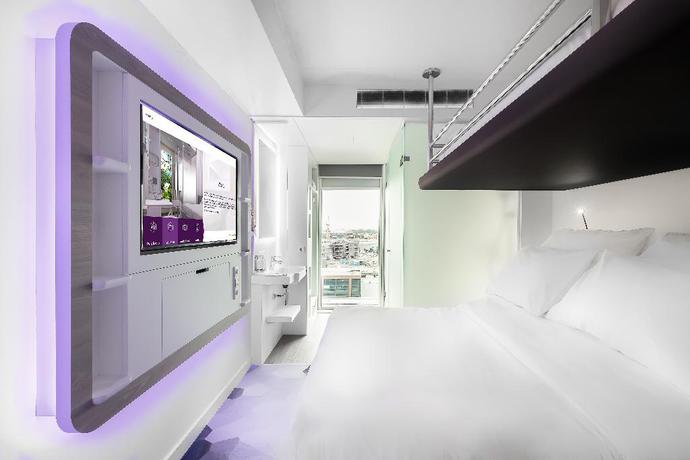 Imagen de la habitación del Hotel Yotel London City. Foto 11