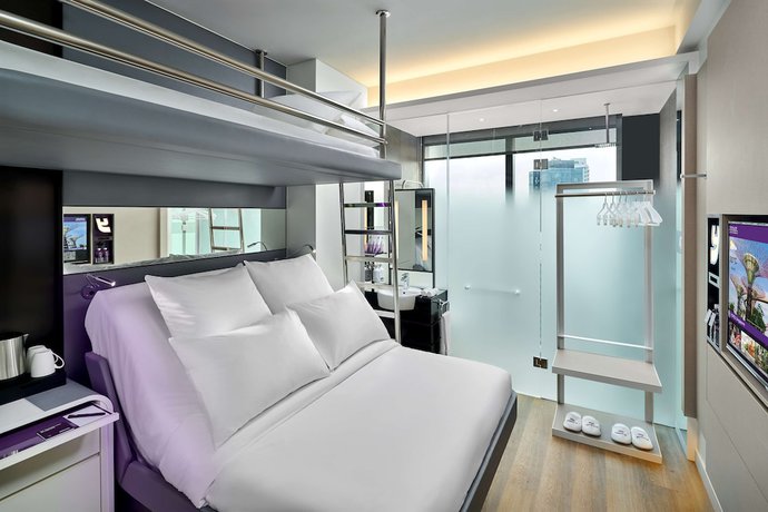 Imagen de la habitación del Hotel Yotel Singapore Orchard Road. Foto 3
