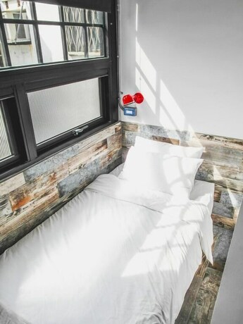 Imagen de la habitación del Hotel You Worth Inn. Foto 19