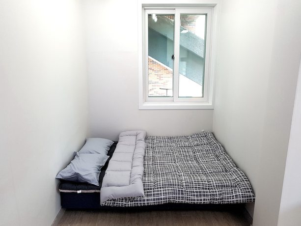 Imagen de la habitación del Hotel You and I Pension. Foto 4