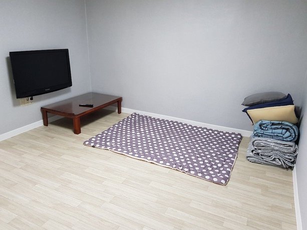 Imagen de la habitación del Hotel You and I Pension. Foto 7