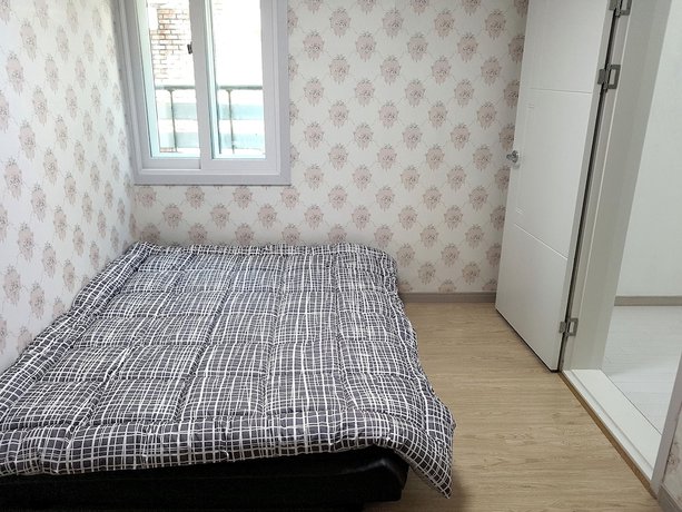 Imagen de la habitación del Hotel You and I Pension. Foto 8