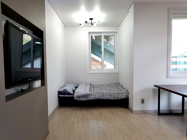 Imagen de la habitación del Hotel You and I Pension. Foto 9