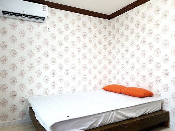 Imagen de la habitación del Hotel You and I Pension. Foto 11
