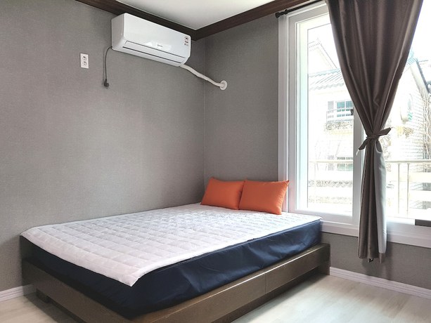 Imagen de la habitación del Hotel You and I Pension. Foto 17