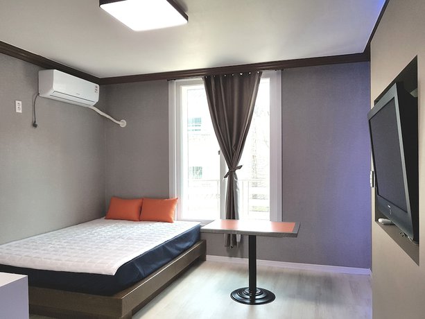 Imagen de la habitación del Hotel You and I Pension. Foto 19