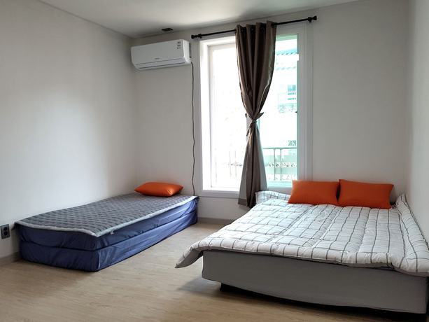 Imagen de la habitación del Hotel You and I Pension. Foto 20