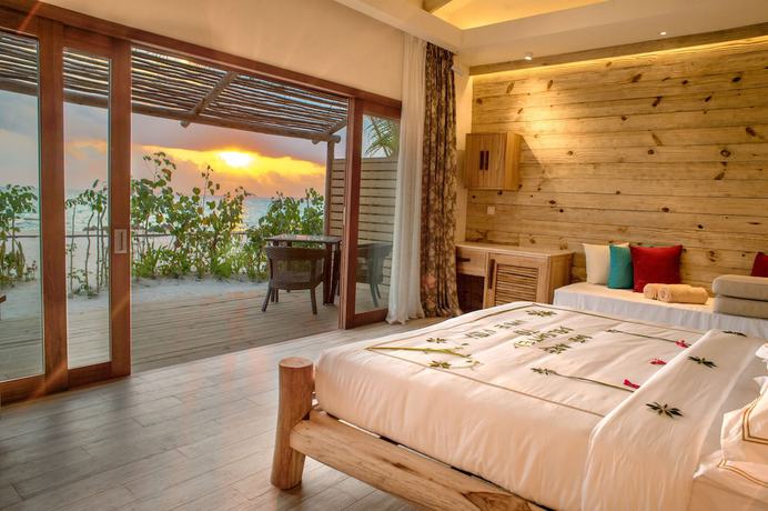 Imagen de la habitación del Hotel You and Me Maldives. Foto 5