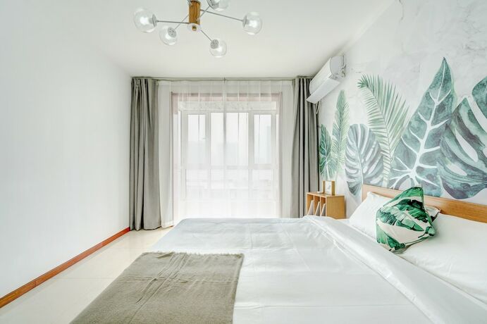 Imagen general del Hotel Youjia Apartment - Flower Valley. Foto 12