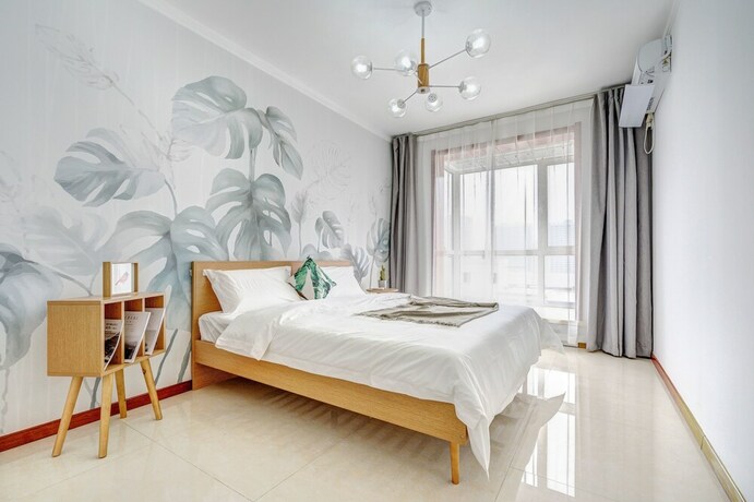Imagen de la habitación del Hotel Youjia Apartment - Flower Valley. Foto 20